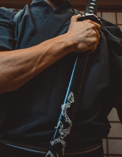 Samurai training in a traditional dojo, in Tokyo